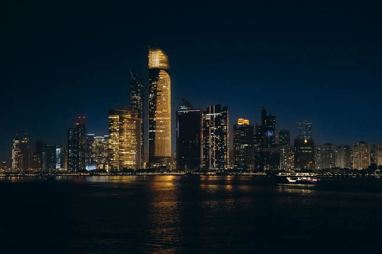 Abu Dhabi skyline at night with city lights