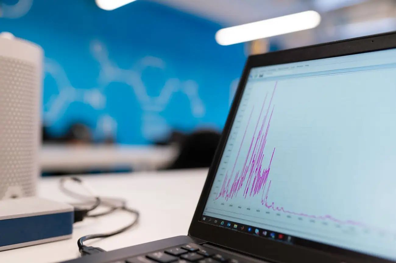 Analytics graph rising on a laptop screen